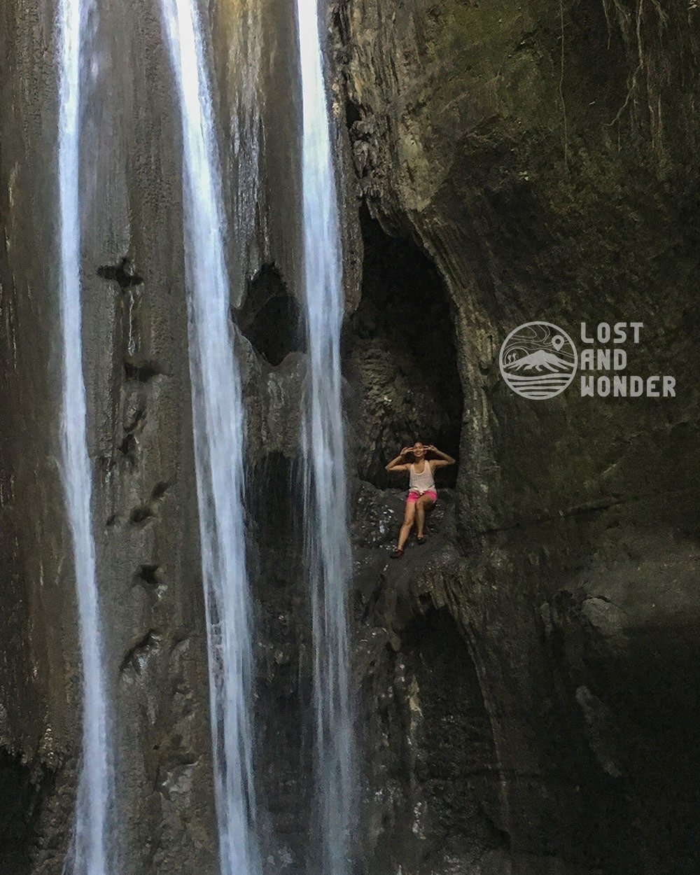 Photo of a traveler inside a cavern in Binalayan Falls Samboan Cebu