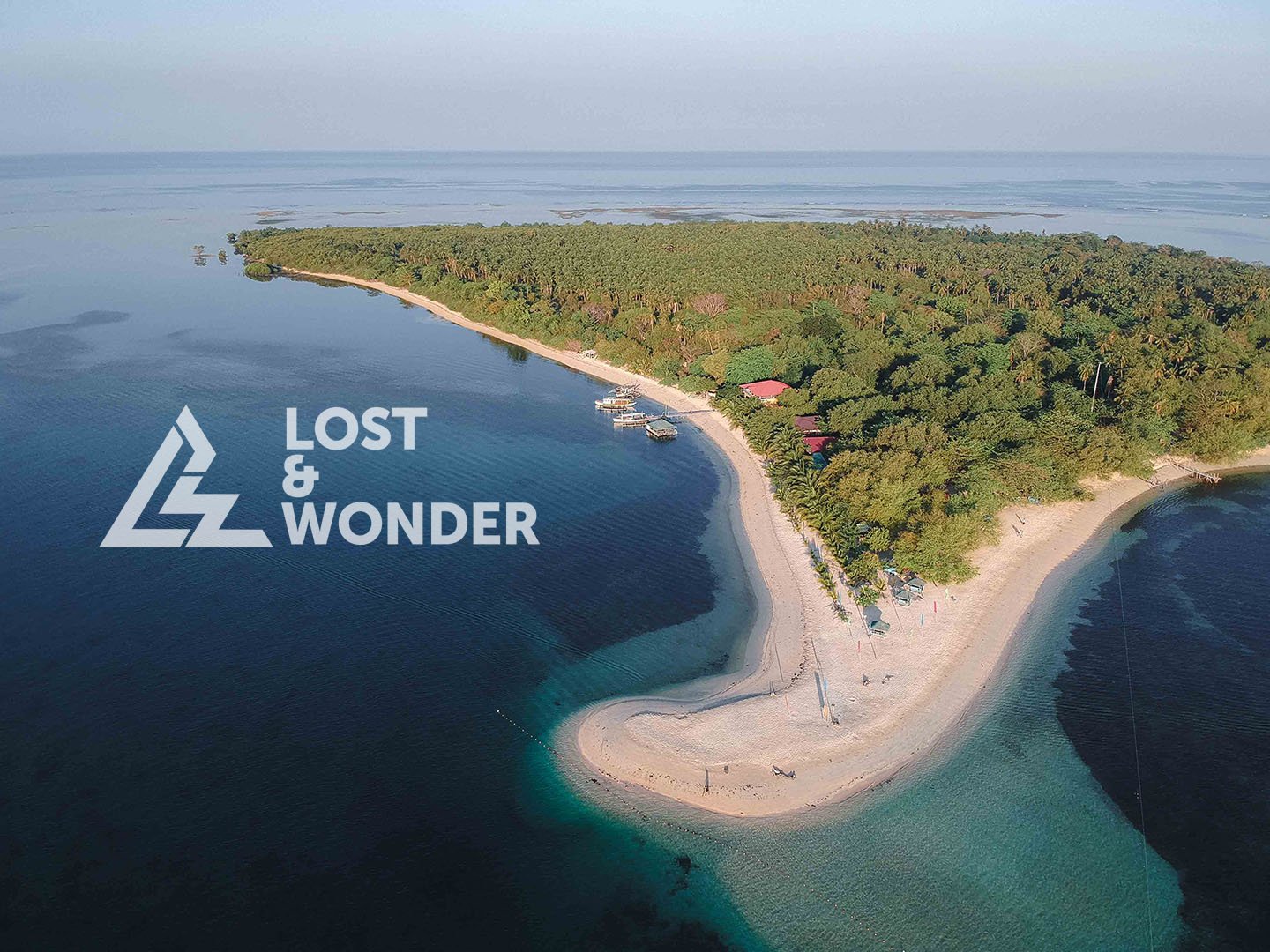 Aerial photo of Magalawa Island with the view of the sandbar